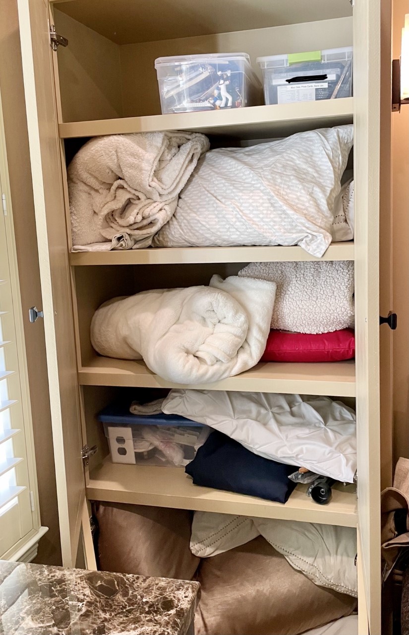 Tanglewood home organizing services - linen closet before